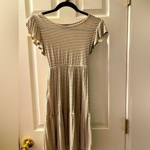 Medium length dress off white with black stripes